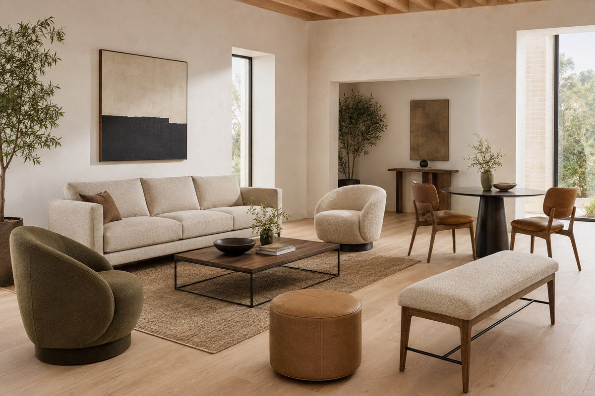 Curated modern seating with sofa, lounge chairs, dining chairs and bench